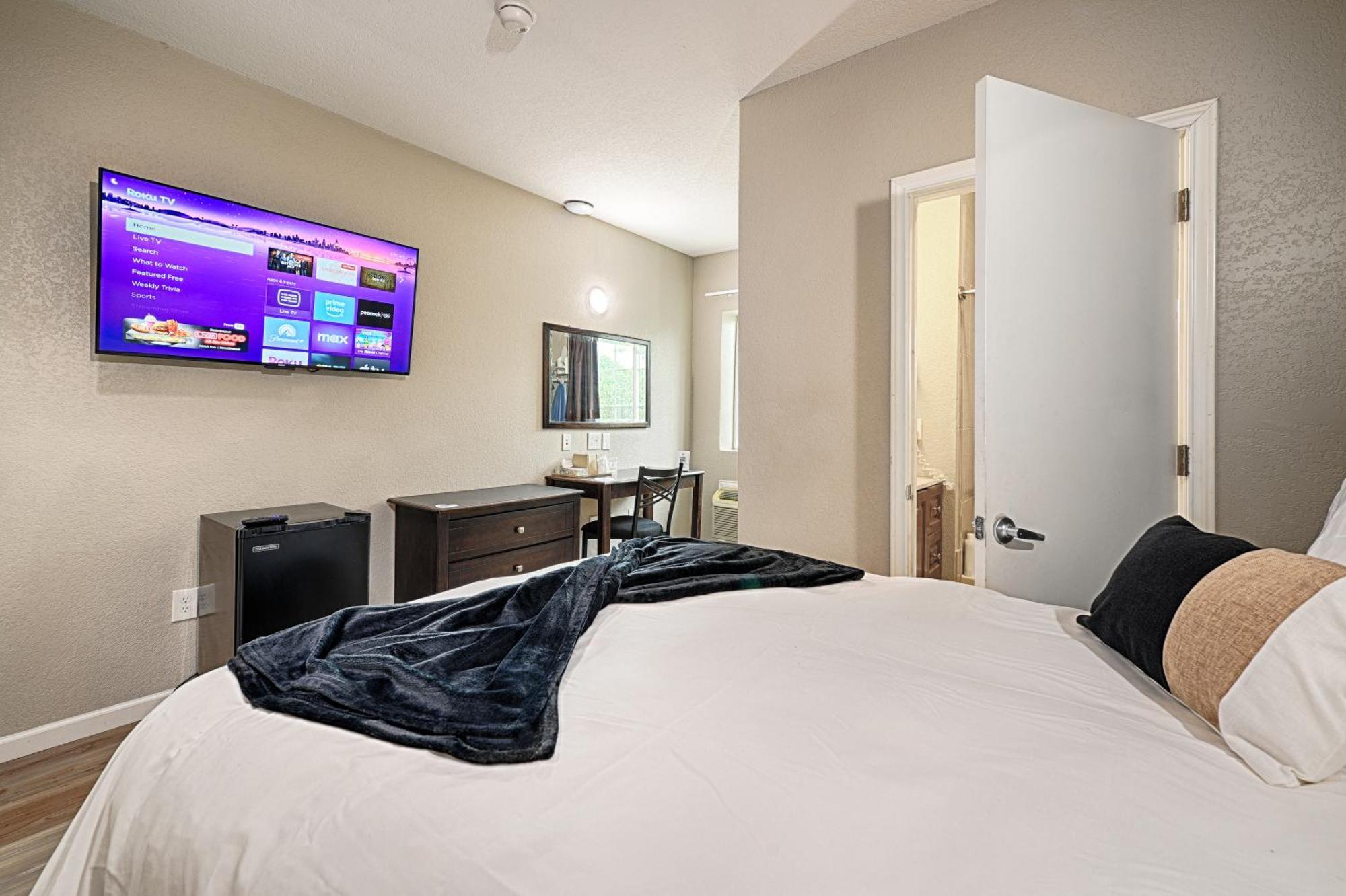 Hotel Dilley Grand Pokoj fotografie
